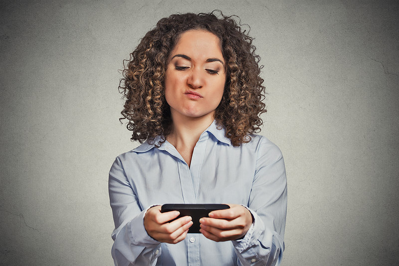 Woman Texting Angry
