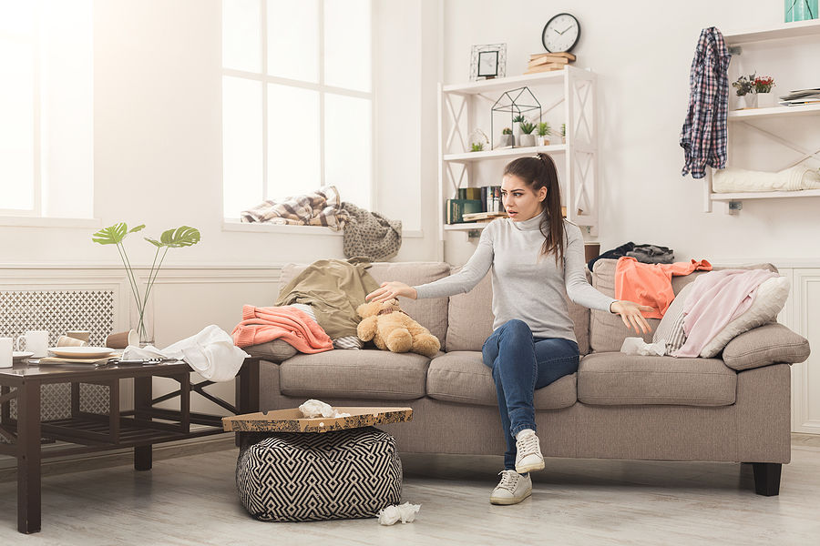 Woman Surrounded by Mess
