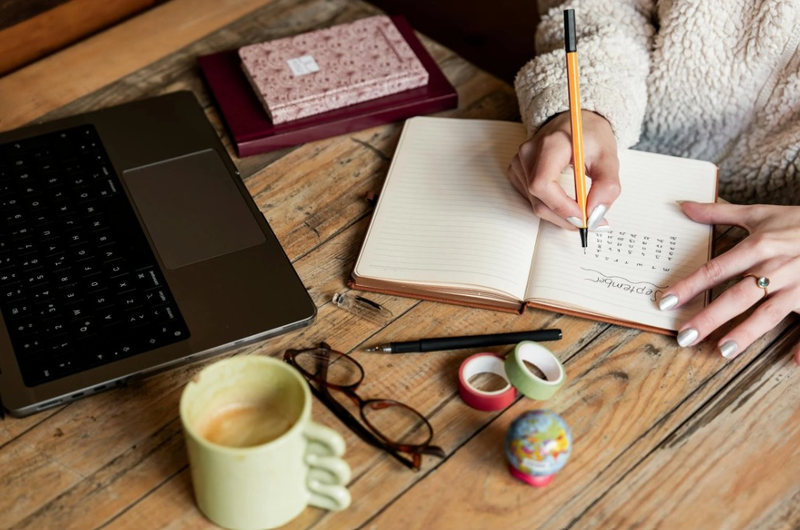 Writing in Notebook