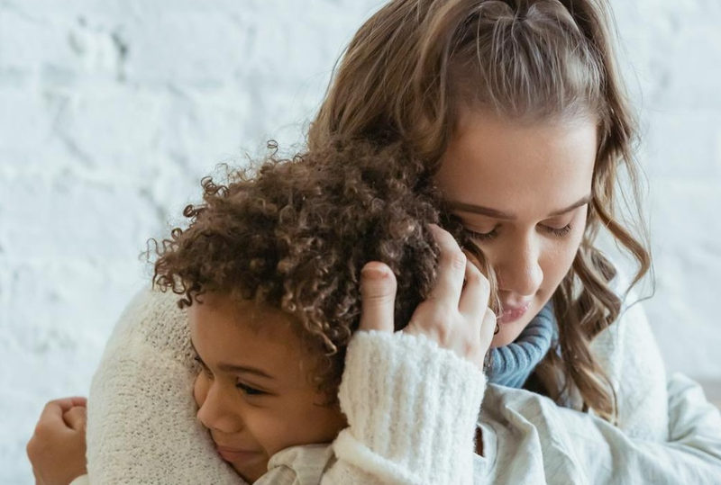 Mum Hugging Son