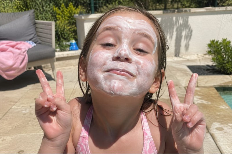 Child Wearing Too Much Suncream