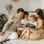 family together looking through magazine
