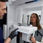 woman-receives-dental-scan-from-doctor-in-clinic