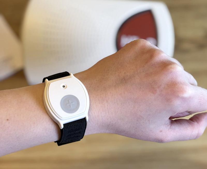 medical alert wristband that reassures a busy family carer
